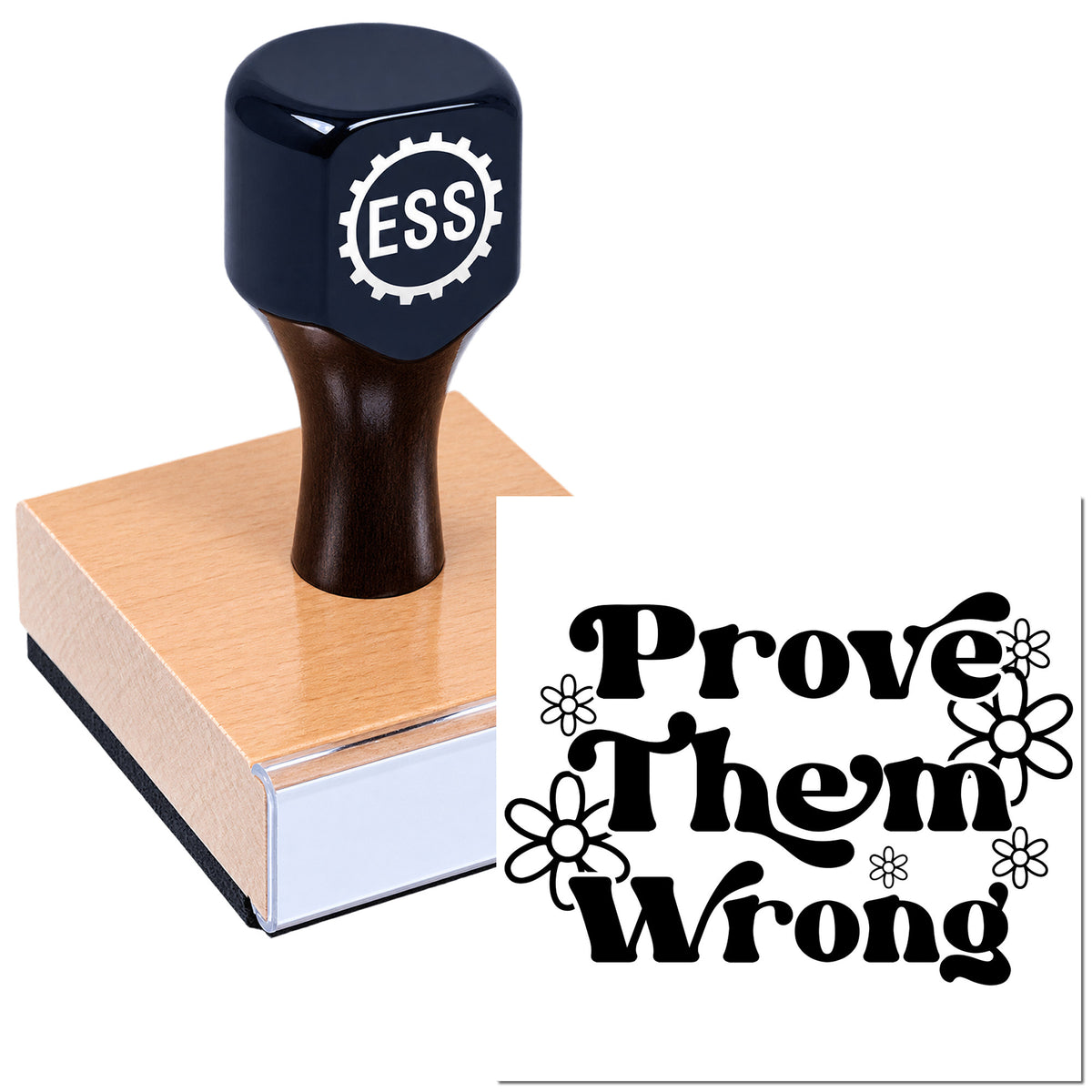 Black rubber stamp and seal on wooden base with ESS logo, showing "Prove Them Wrong" in decorative floral print.