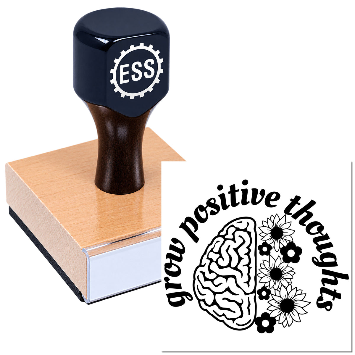Dark blue ESSI stamp seal on copper block, with black "grow positive thoughts" brain-and-flowers imprint.
