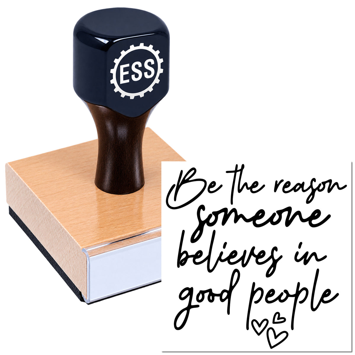 Black ESS rubber stamp on pink block base, with a seal reading "Be the reason someone believes in good people."