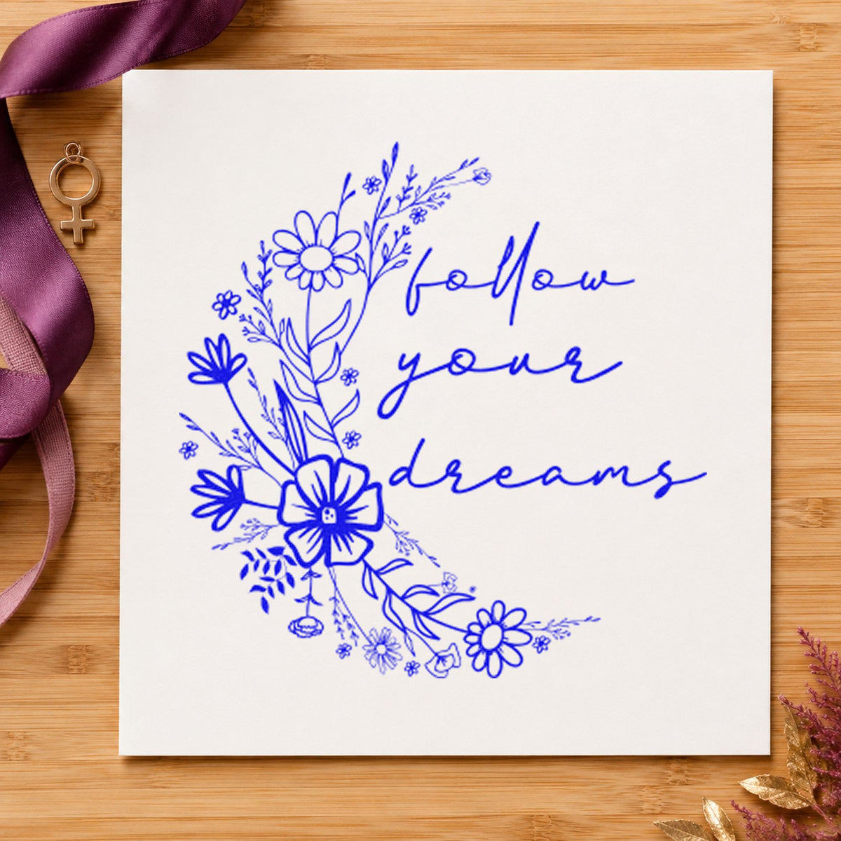 Follow Your Dreams Flowers craft stamp in blue ink on cardstock, an easy option for field bag printing.