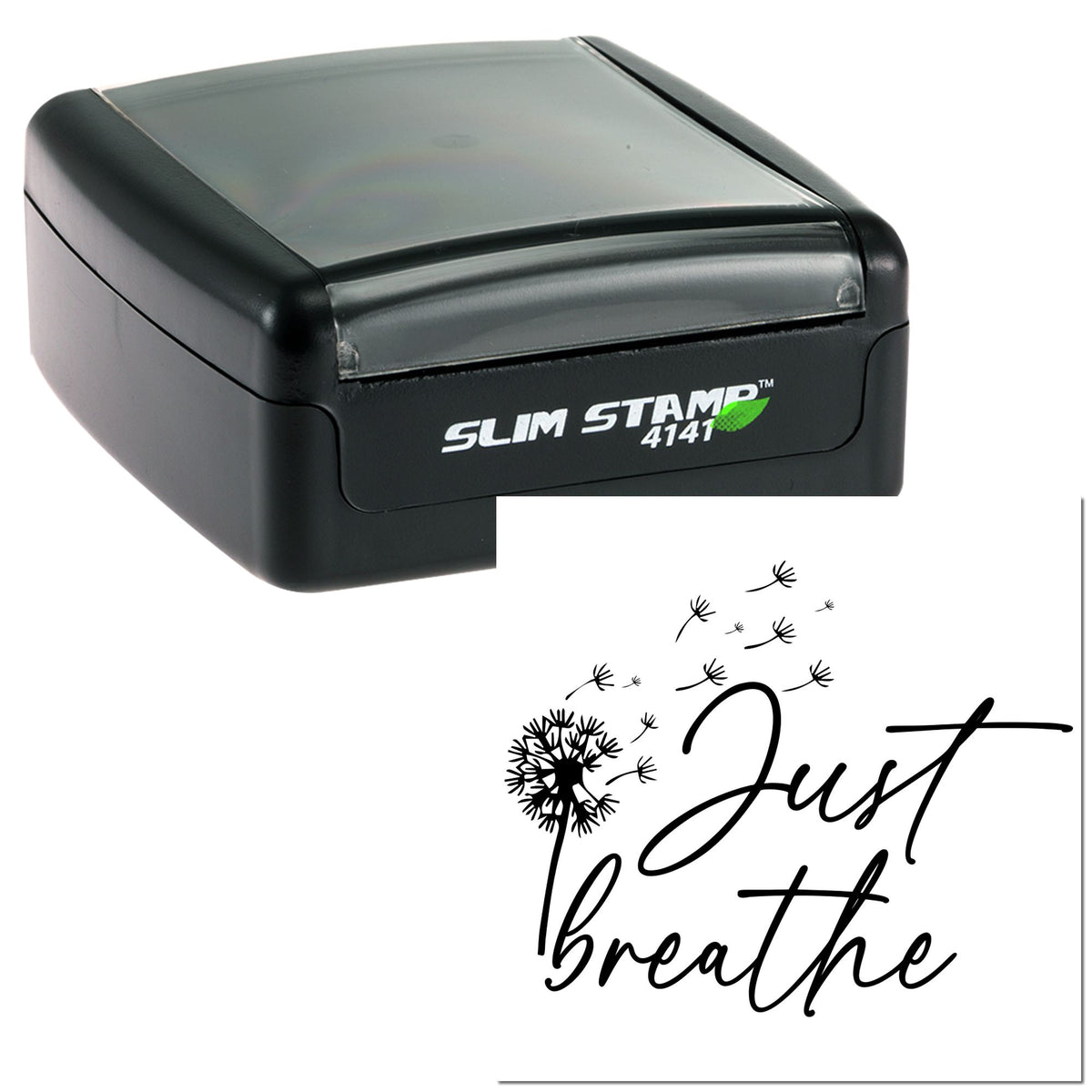 Black self-inking Slim Stamp 4141 with white Just breathe dandelion design on a white background.