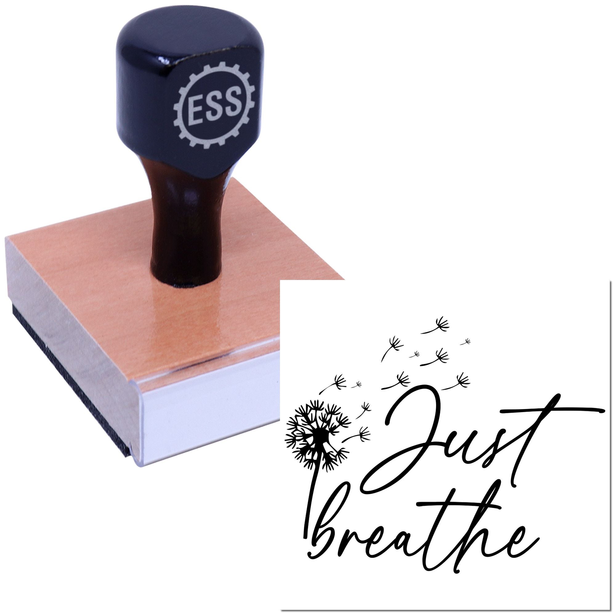 Navy ESS stamp and seal on a pink wooden block, with dandelion Just breathe seal design preview.