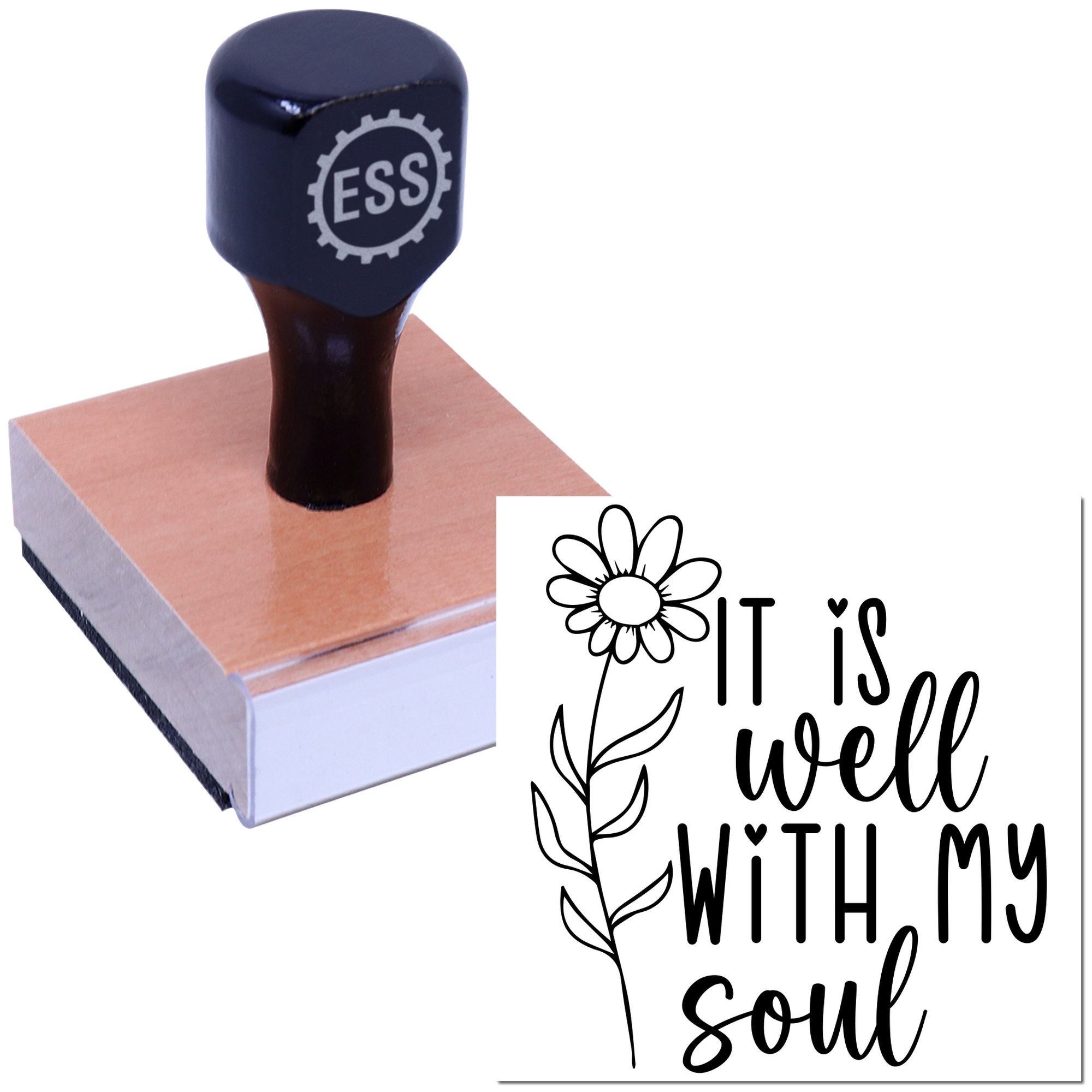 Dark blue custom rubber stamp on pink wooden seal block, featuring black floral It is well with my soul design.