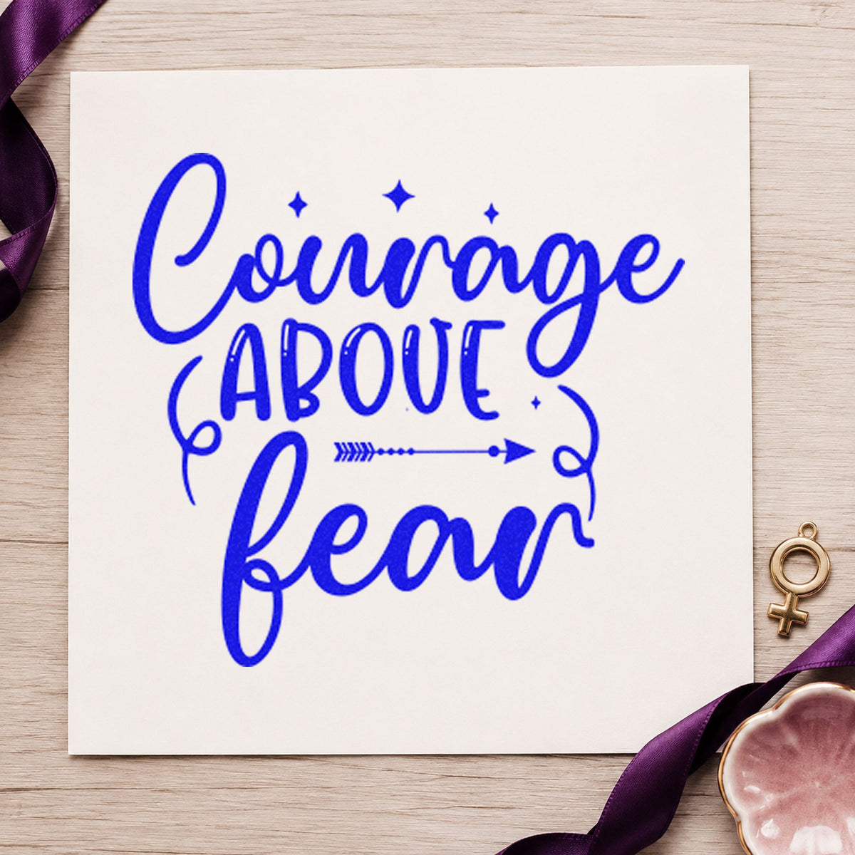 Courage and Fear Arrow craft stamp imprinted in blue ink on paper, a design suited to framed hall hook.
