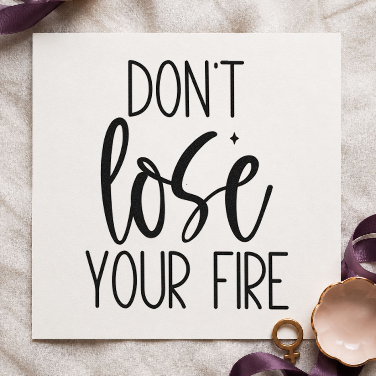 Do Not Lose Fire craft stamp in black ink on cardstock, an easy option for anvil album page.