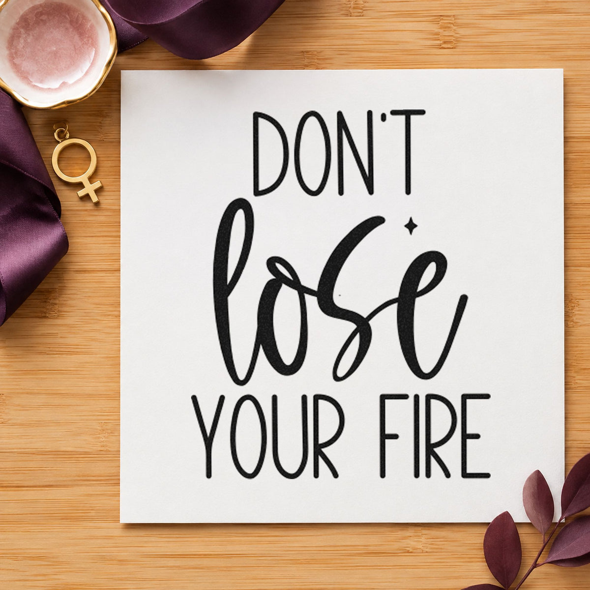 Do Not Lose Fire craft stamp imprint in black ink on a handmade project, one idea being forged piece tags.