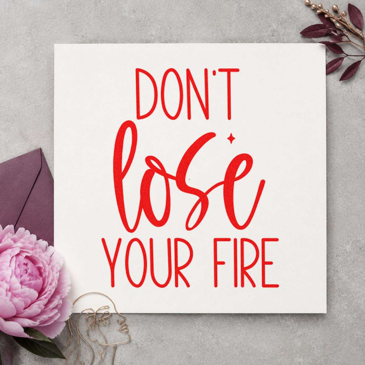 Do Not Lose Fire craft stamp imprint in red ink on a handmade project, one idea being care note cards.