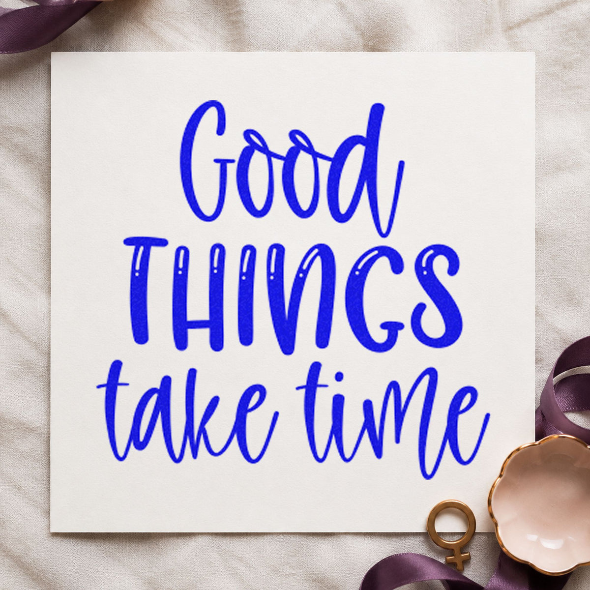 Good Things Take Time craft stamp in blue ink on cardstock, an easy option for proving cloth printing.