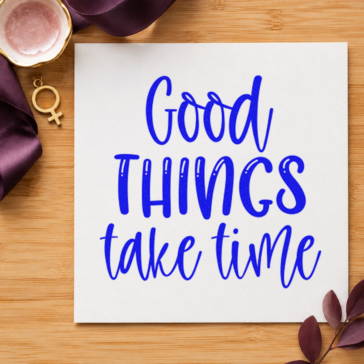 Good Things Take Time craft stamp imprinted in blue ink on paper, a design suited to framed kitchen shelf.