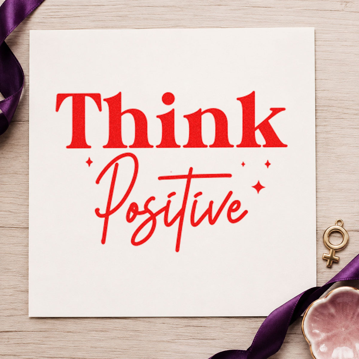 Think Positive Sparkle Lettering rubber stamp shown in red ink, stamped for projects such as shelf product labels.