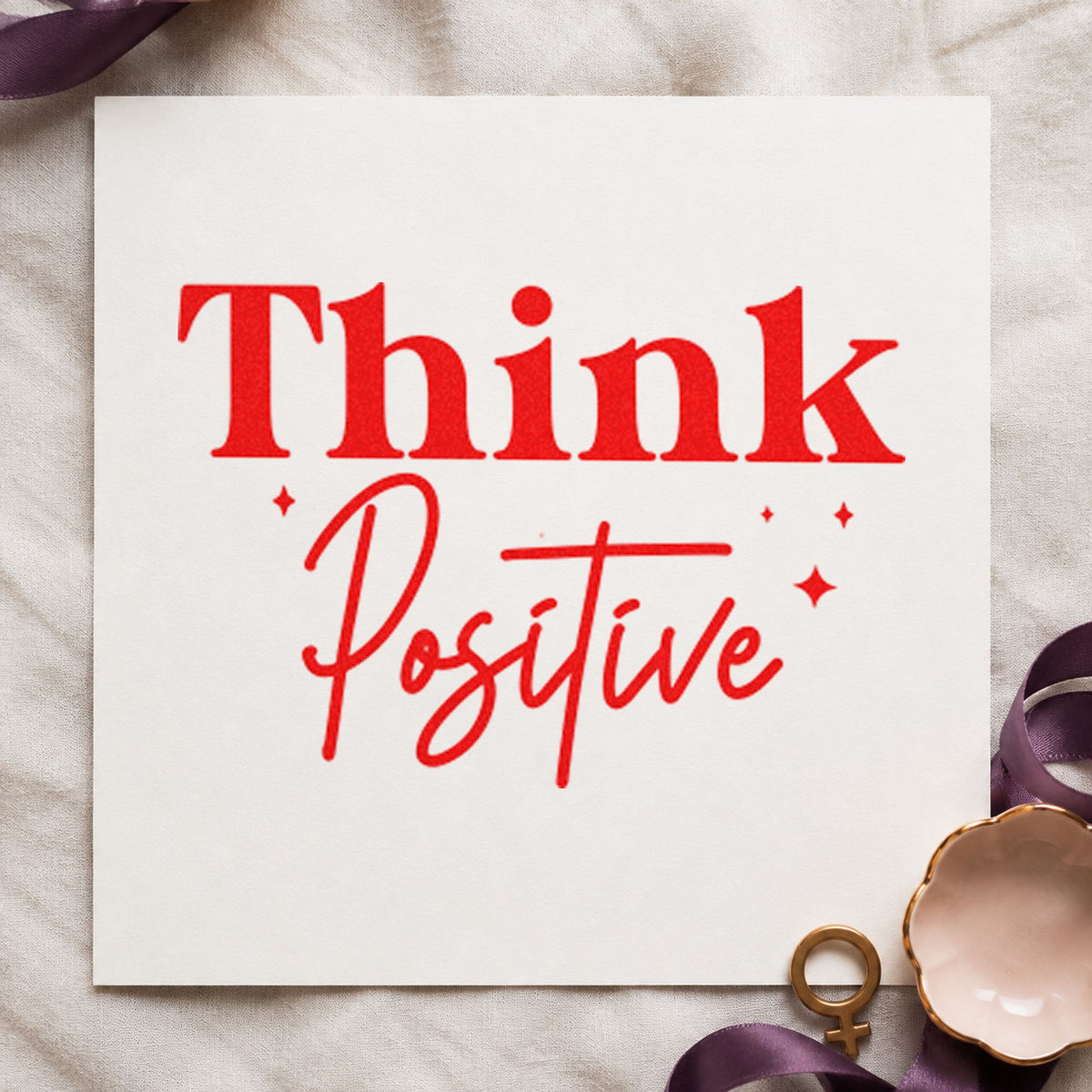 Think Positive Sparkle Lettering craft stamp imprint in red ink on a handmade project, one idea being reminder note cards.