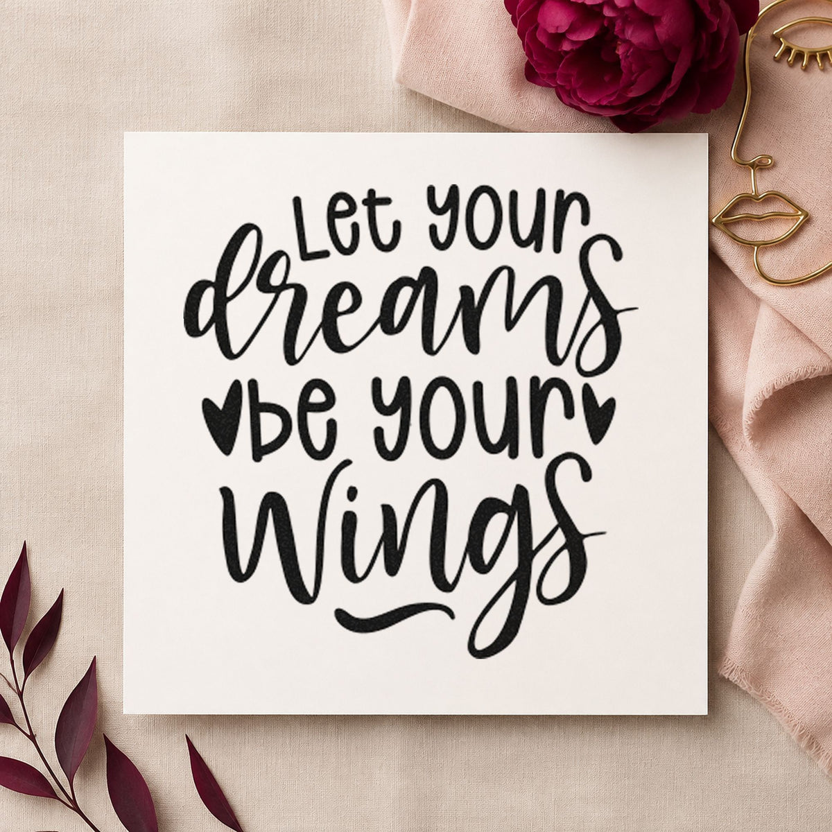 Dreams Be Your Wings craft stamp imprint in black ink on a handmade project, one idea being model kit gift tags.