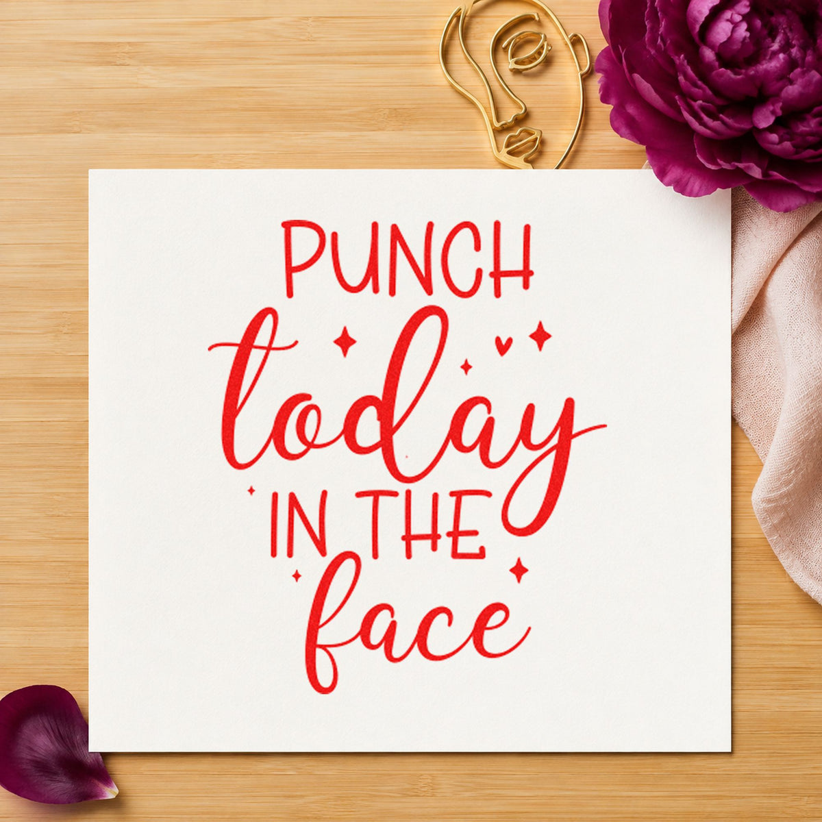 Punch Today In Face rubber stamp shown in red ink, stamped for projects such as bin zone labels.