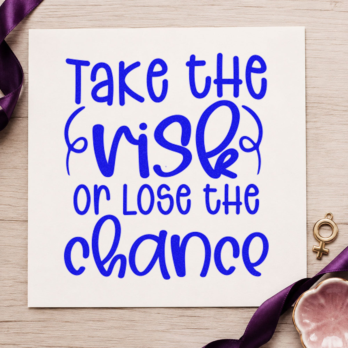 Take The Risk Quote craft stamp in blue ink on cardstock, an easy option for desk cloth printing.