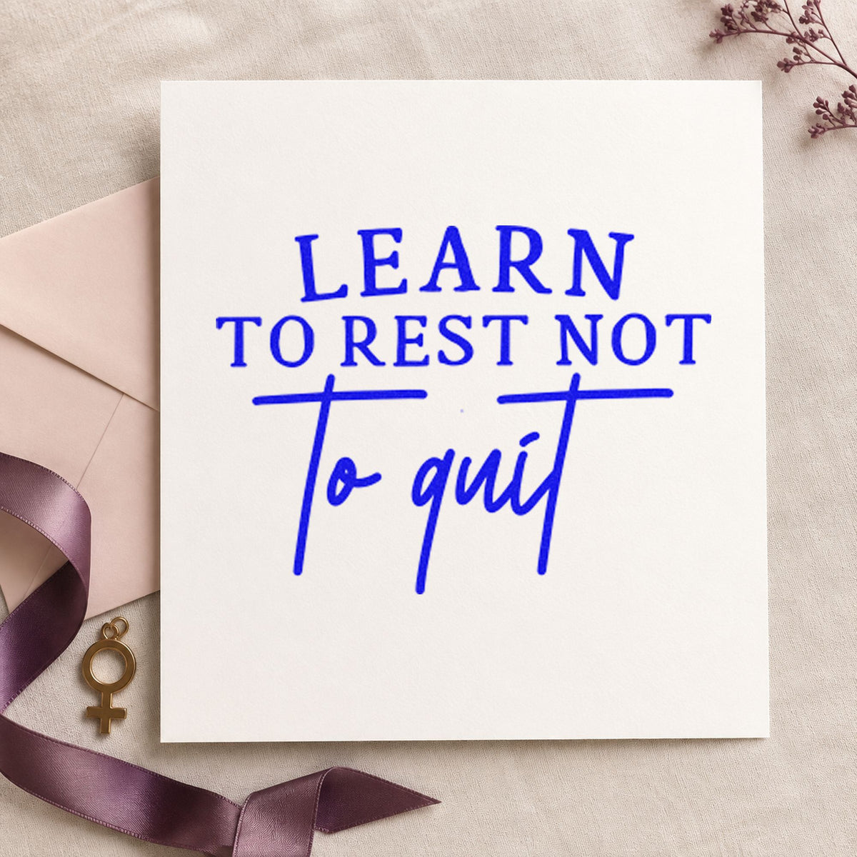 Learn To Rest Quote craft stamp imprinted in blue ink on paper, a design suited to framed bedroom corner.
