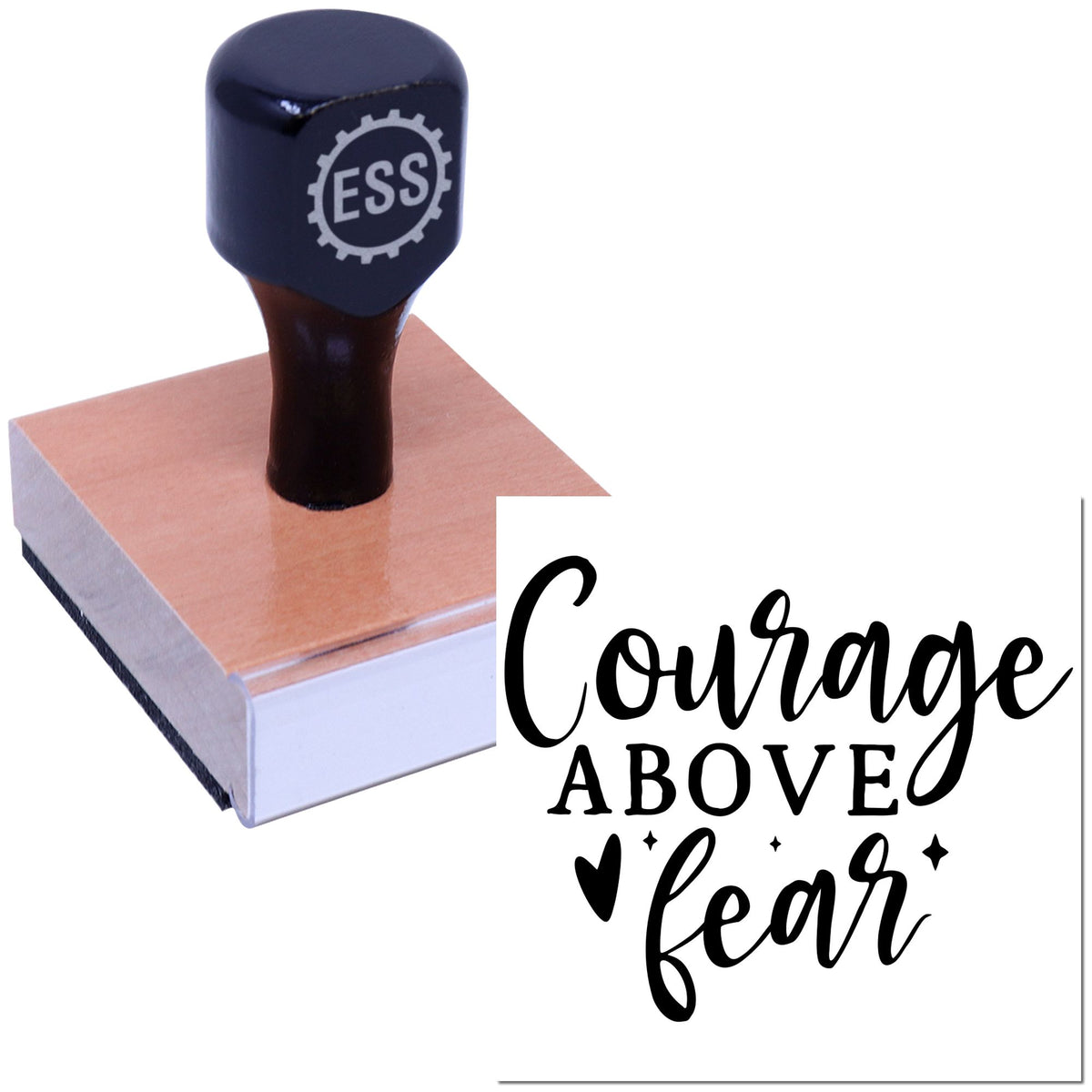 Navy custom stamp and seal on a pink block, with black "Courage Above Fear" lettering and a dark handle.