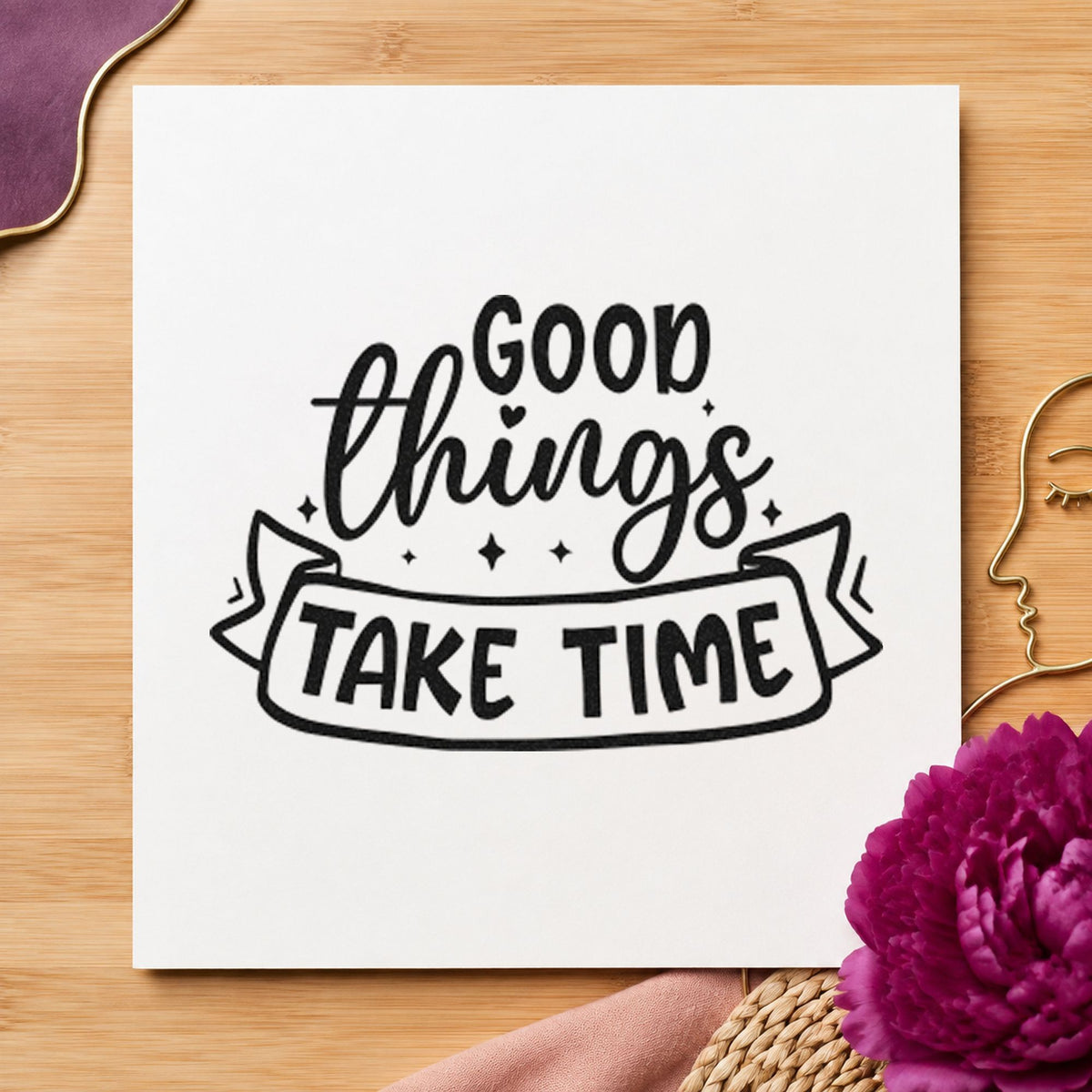 Good Things Take Time craft stamp imprint in black ink on a handmade project, one idea being wheel gift tags.