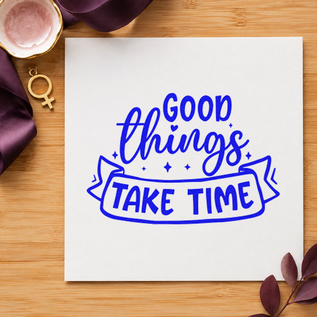 Good Things Take Time craft stamp imprinted in blue ink on paper, a design suited to framed aging cave.