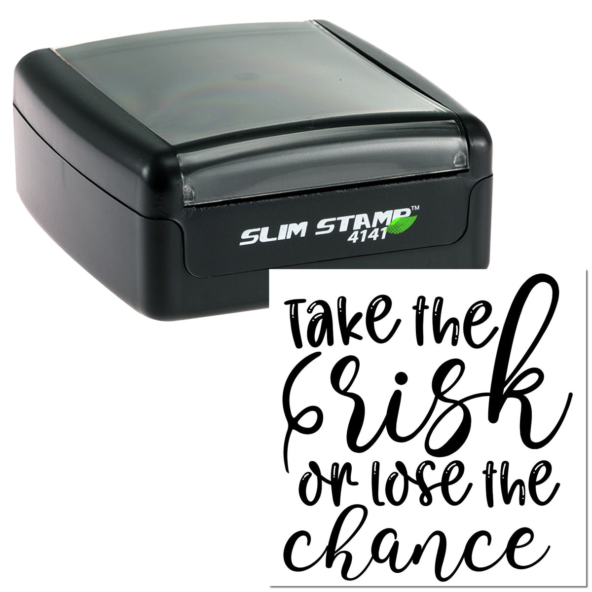 Black slim self-inking stamp/seal with translucent gray lid, printing Take the risk or lose the chance in black script.