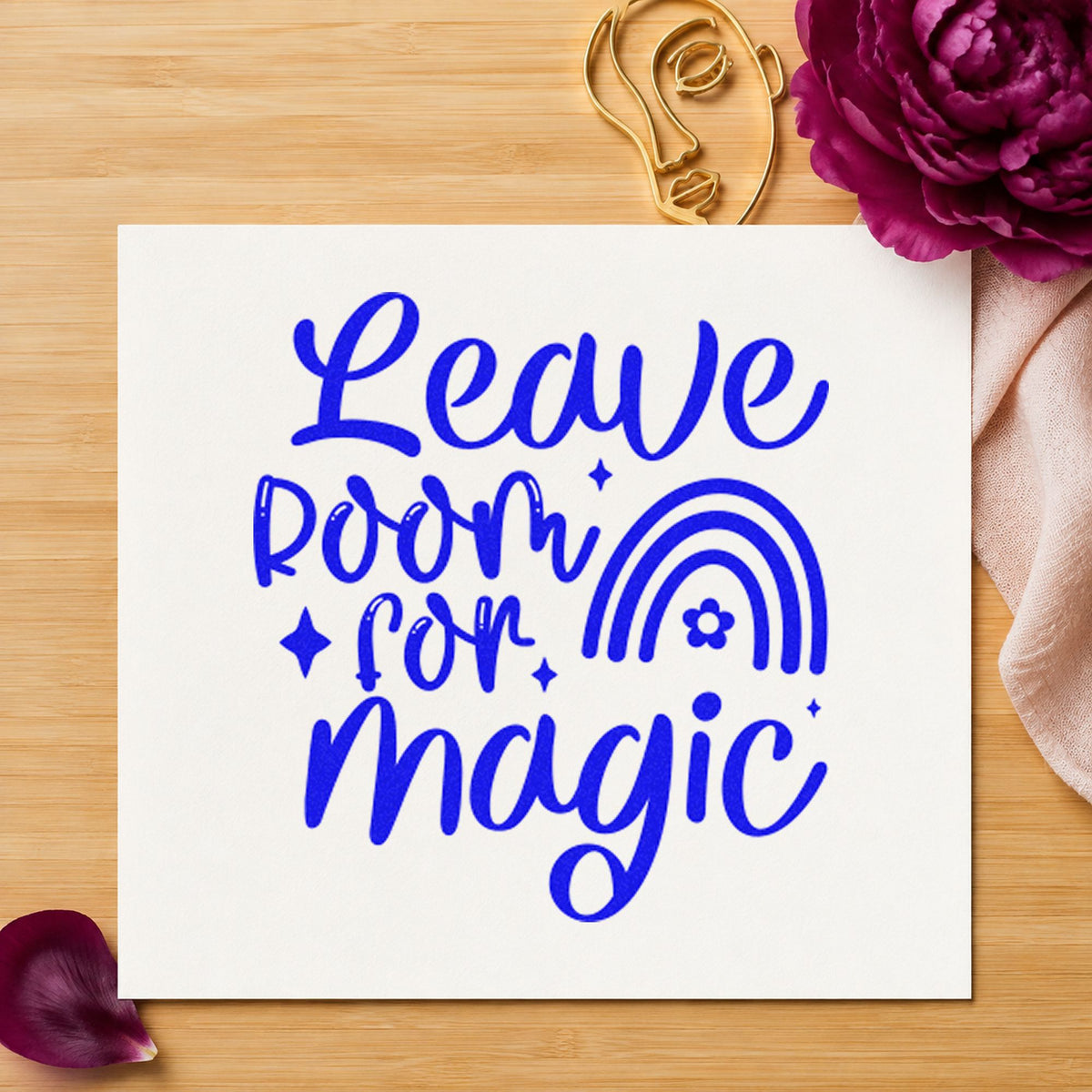 Leave Room Magic Rainbow craft stamp imprinted in blue ink on paper, a design suited to framed breakfast nook.