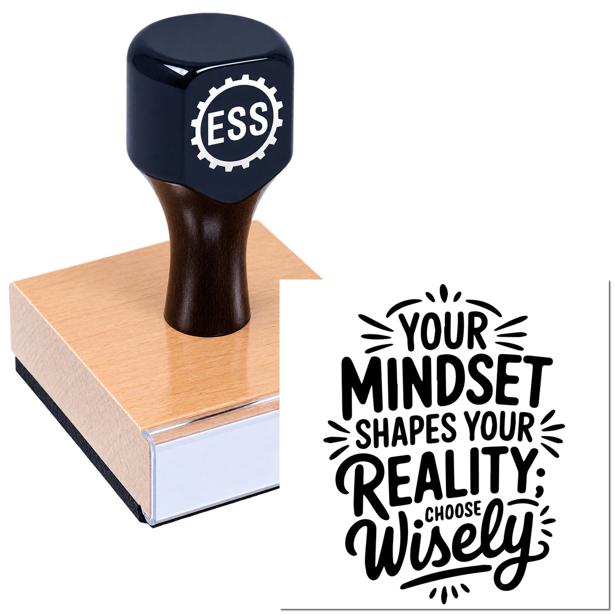 Black ESS custom stamp on a wooden seal block, with a motivational "Your mindset shapes your reality" design.