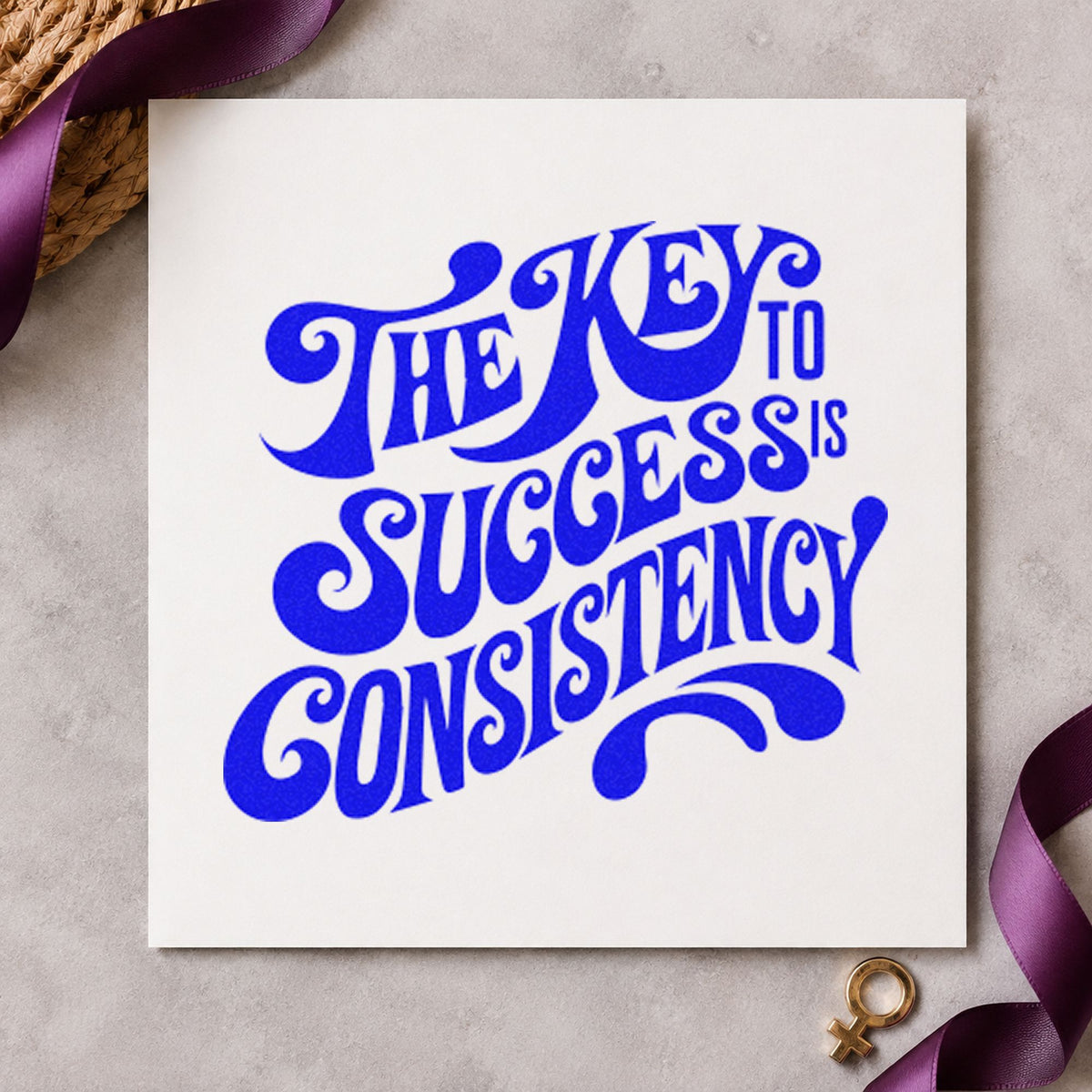 Key To Success Consistency craft stamp imprinted in blue ink on paper, a design suited to framed home desk.