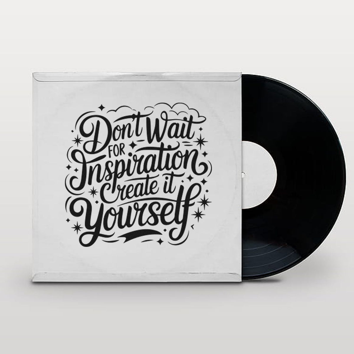 White stamp and seal packaging with black script quote Dont Wait for Inspiration Create it Yourself and black disc