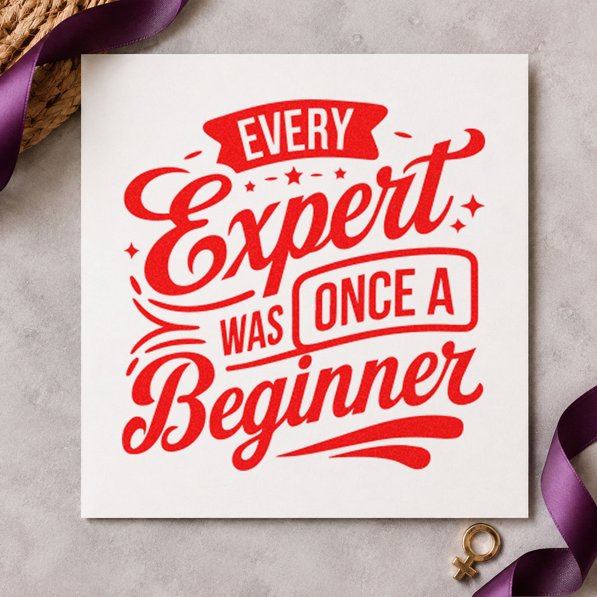 Every Expert Once Beginner rubber stamp shown in red ink, stamped for projects such as station knife labels.