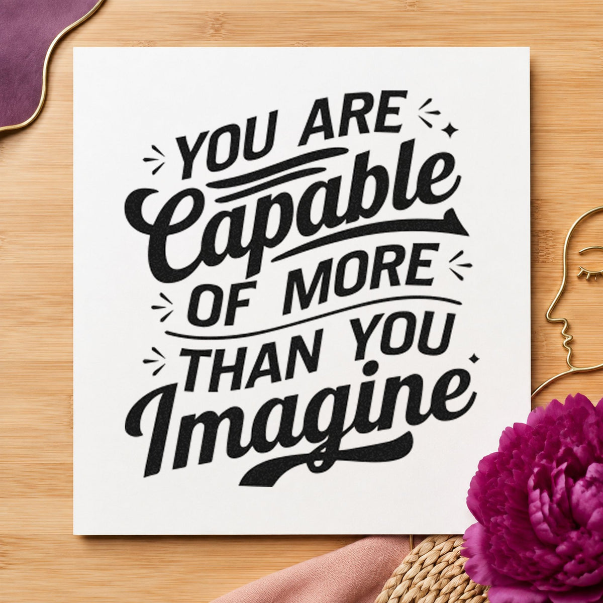 More Capable Than Imagine craft stamp imprint in black ink on a handmade project, one idea being kit issue gift tags.