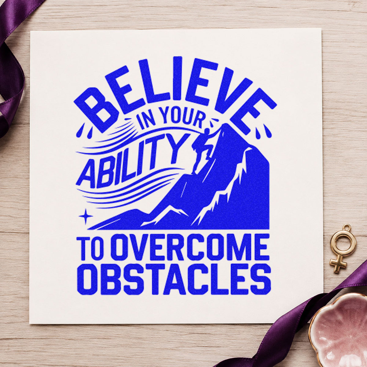 Believe Ability Overcome Obstacles craft stamp imprinted in blue ink on paper, a design suited to framed base shelter.