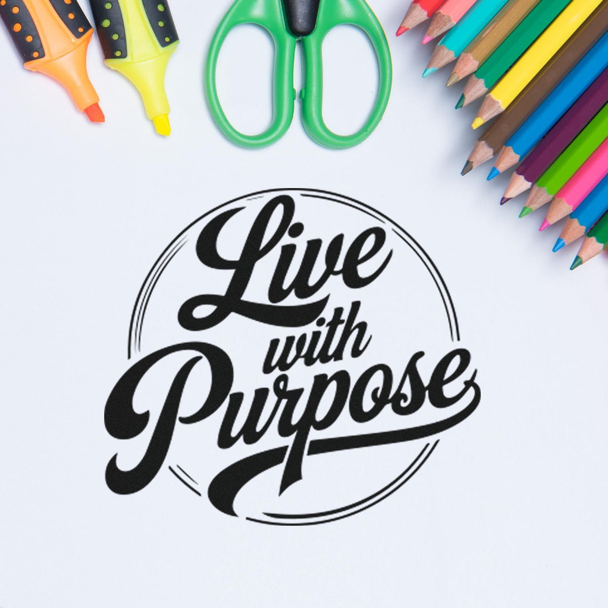 Black Live with Purpose stamp and seal design, surrounded by colorful pencils, scissors, and markers on a white background.