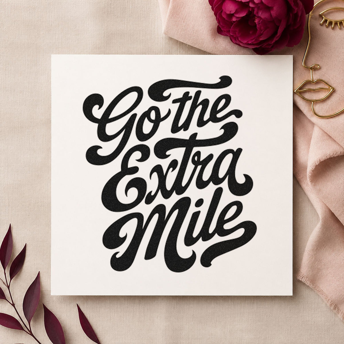 Go The Extra Mile craft stamp imprint in black ink on a handmade project, one idea being delivery bag tags.