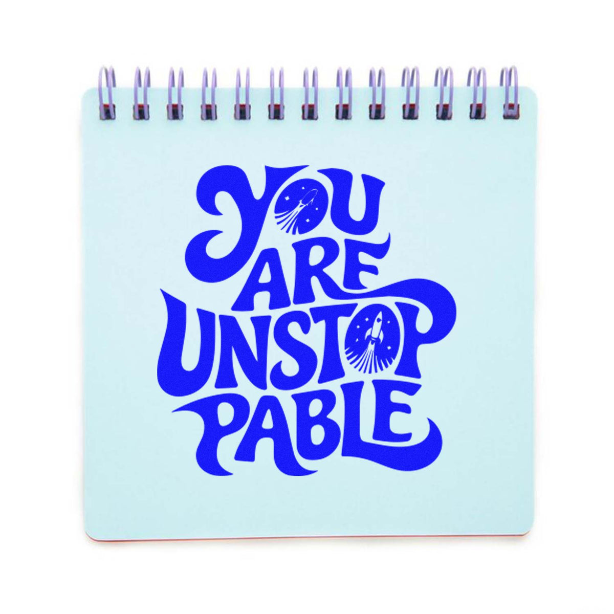 Light blue spiral-bound stamp and seal pad with bold blue You Are Unstoppable lettering and rocket accents.