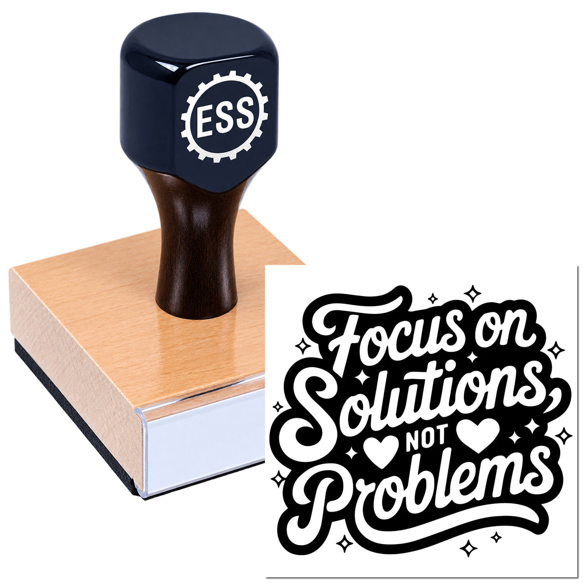 Black ESSI stamp and seal on pink block with white-and-black "Focus on Solutions Not Problems" design.