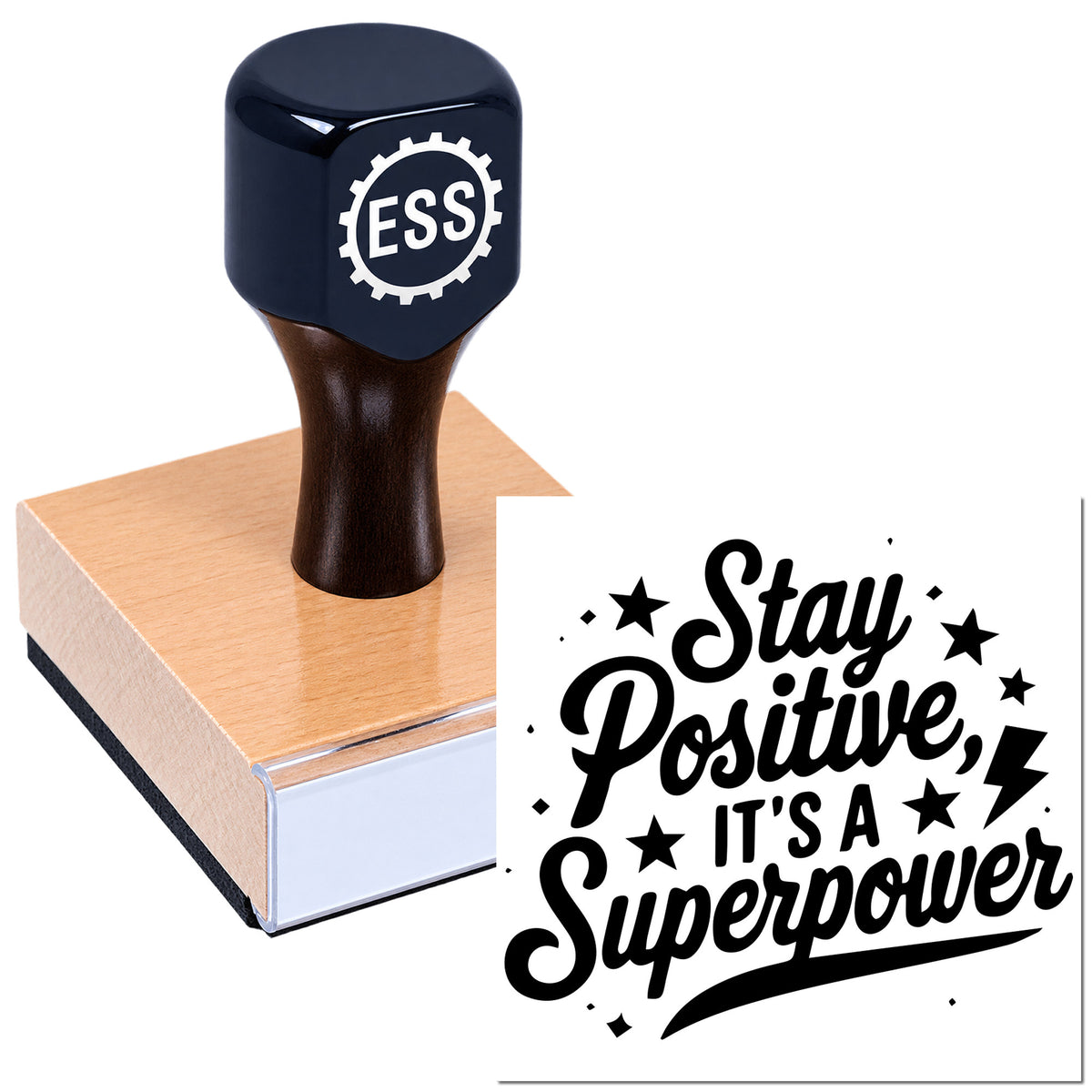 Black ESS rubber stamp on a pink seal pad, with a bold "Stay Positive, It's a Superpower" imprint.