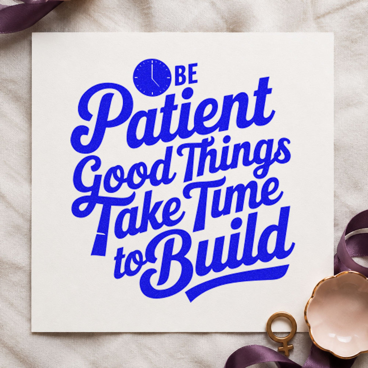 Be Patient Good Things craft stamp imprinted in blue ink on paper, a design suited to framed hobby table.