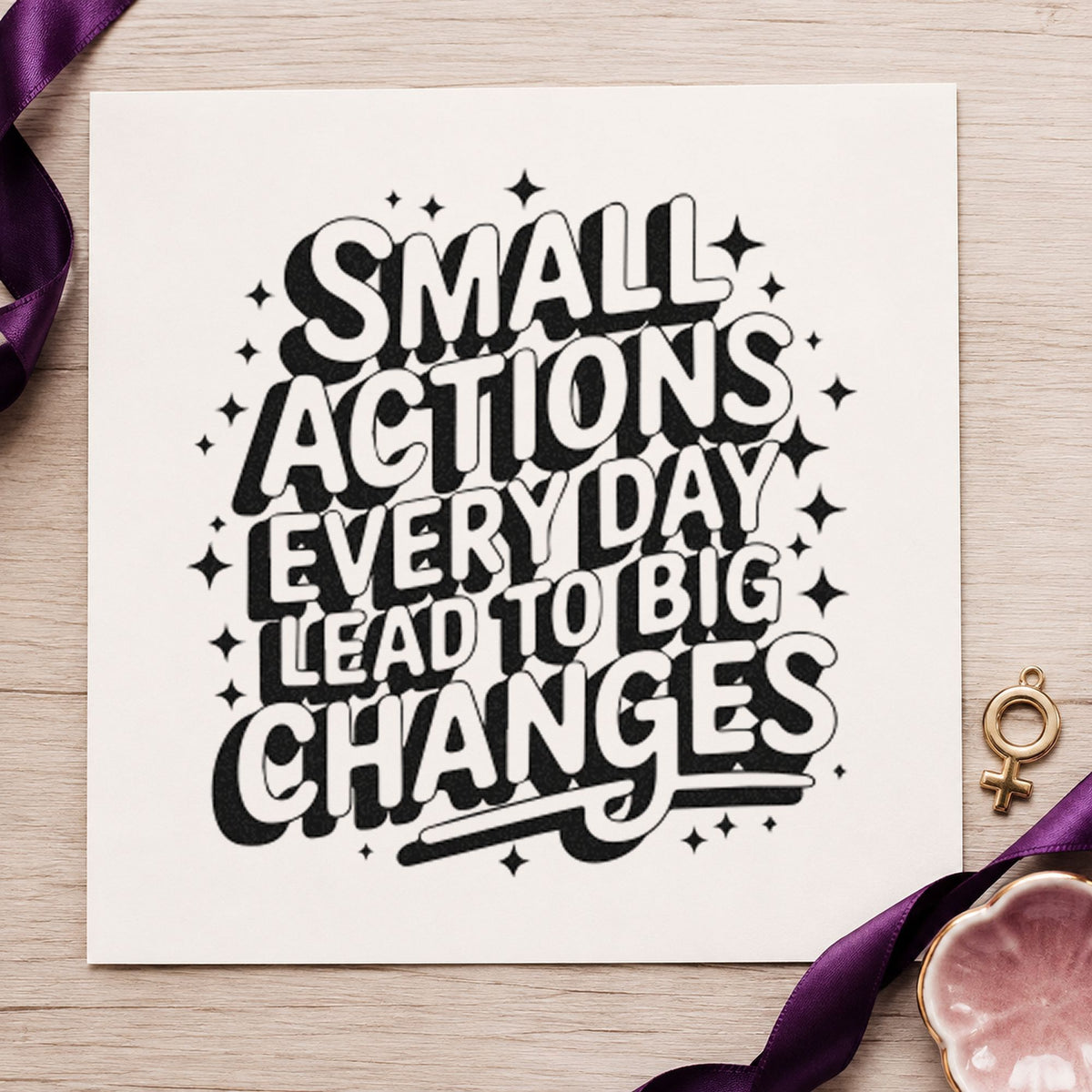 Small Actions Big Changes craft stamp imprint in black ink on a handmade project, one idea being film roll gift tags.