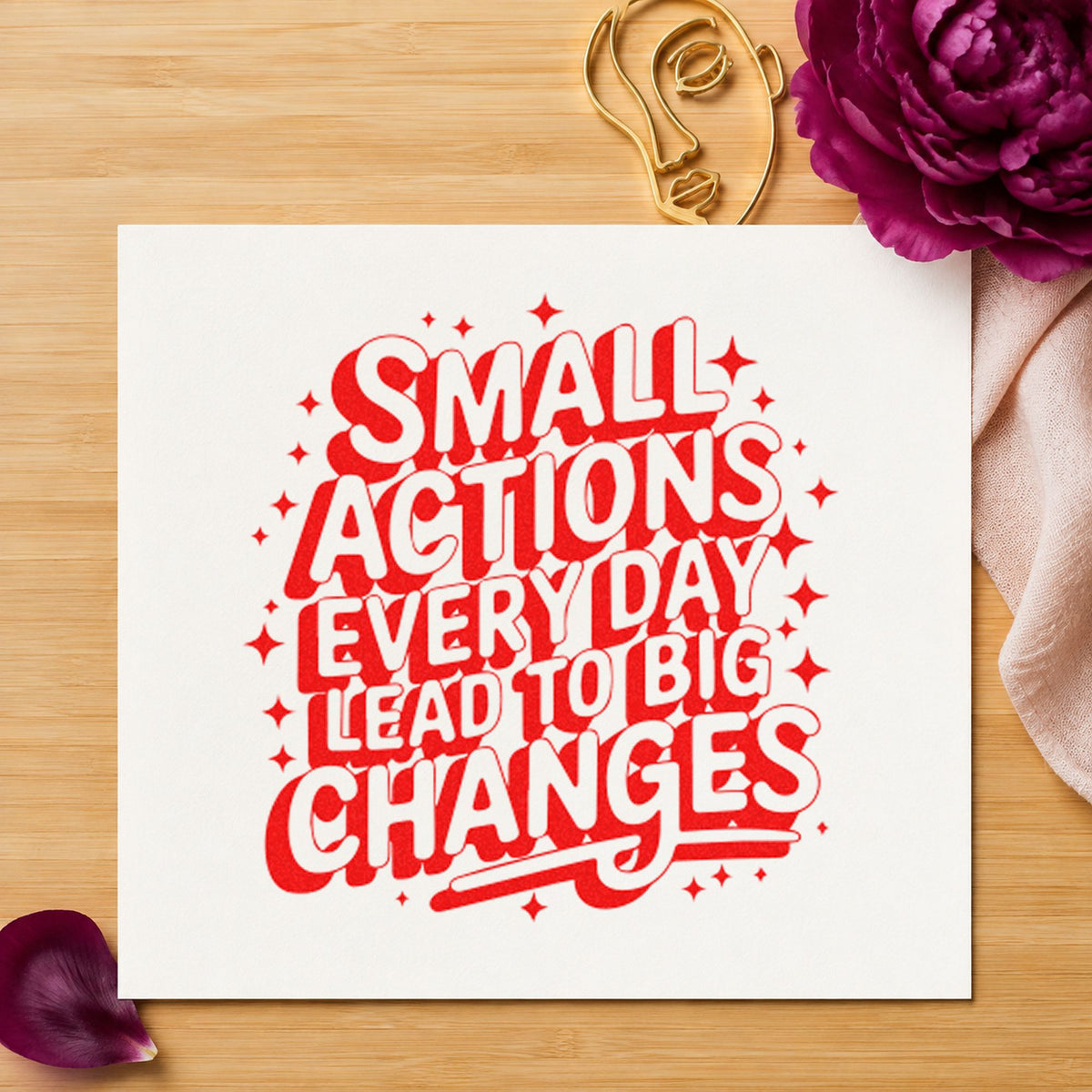 Small Actions Big Changes craft stamp imprint in red ink on a handmade project, one idea being prompt shoot cards.