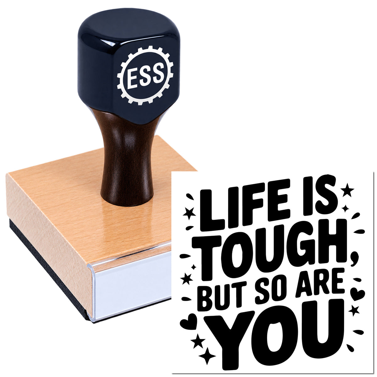 Dark blue ESS rubber stamp on a wood block, with black "Life is tough, but so are you" seal design.