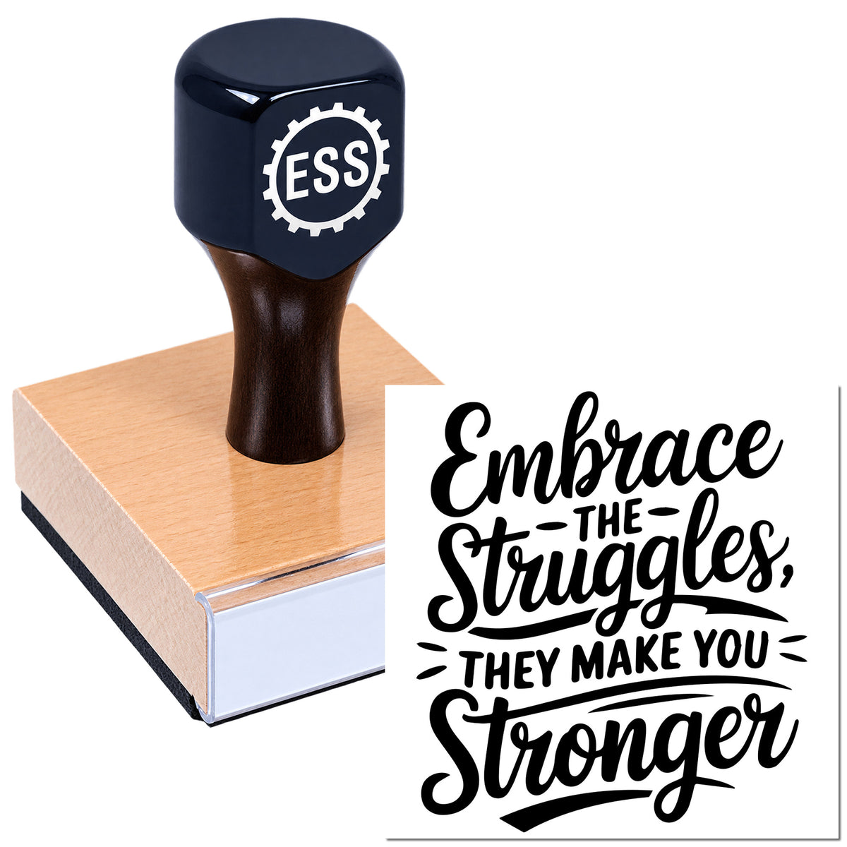 Navy and black rubber stamp with ESS gear logo beside a wooden seal block and bold motivational quote.