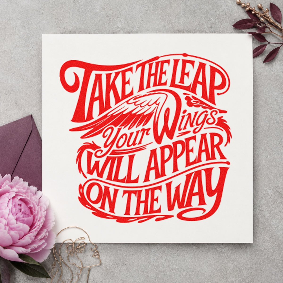 Take Leap Wings Appear craft stamp imprint in red ink on a handmade project, one idea being open invite cards.
