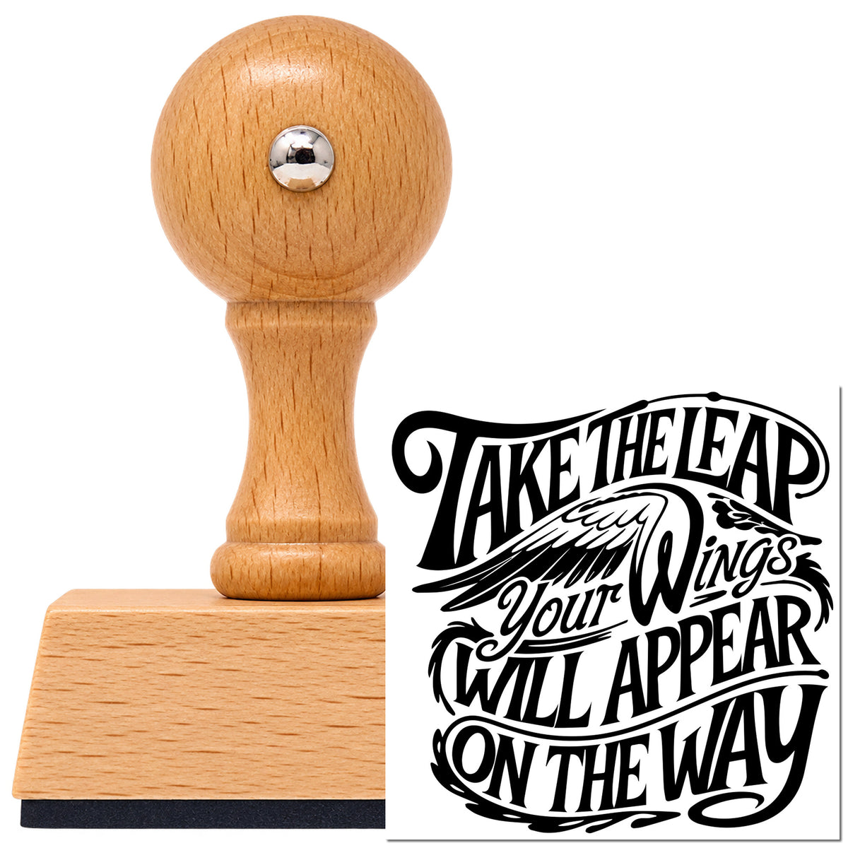 Vintage Pro beech wood stamp with a round knob handle, shown with its black Take Leap Wings Appear imprint on white.