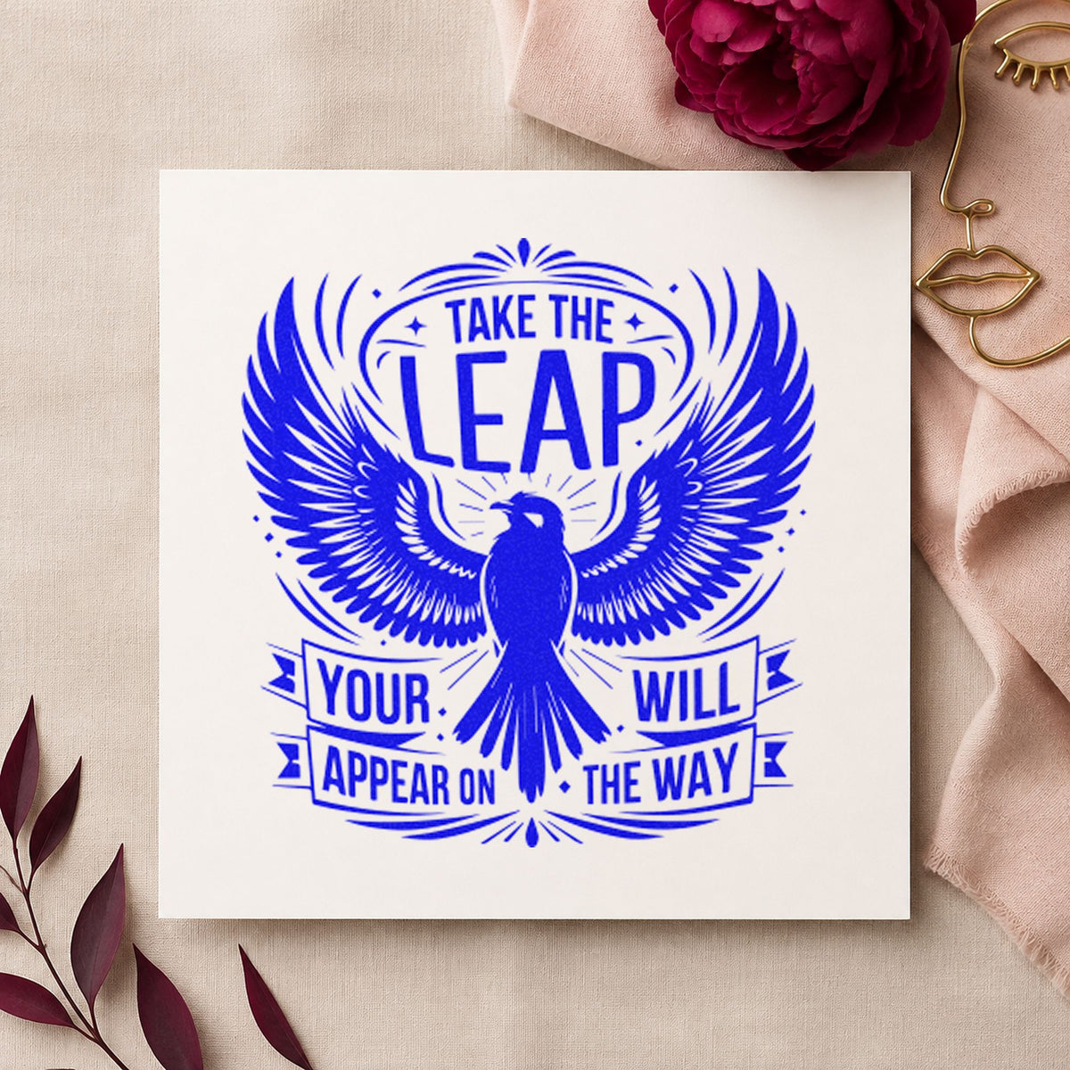 Take the Leap Eagle Banner craft stamp in blue ink on cardstock, an easy option for bag panel printing.