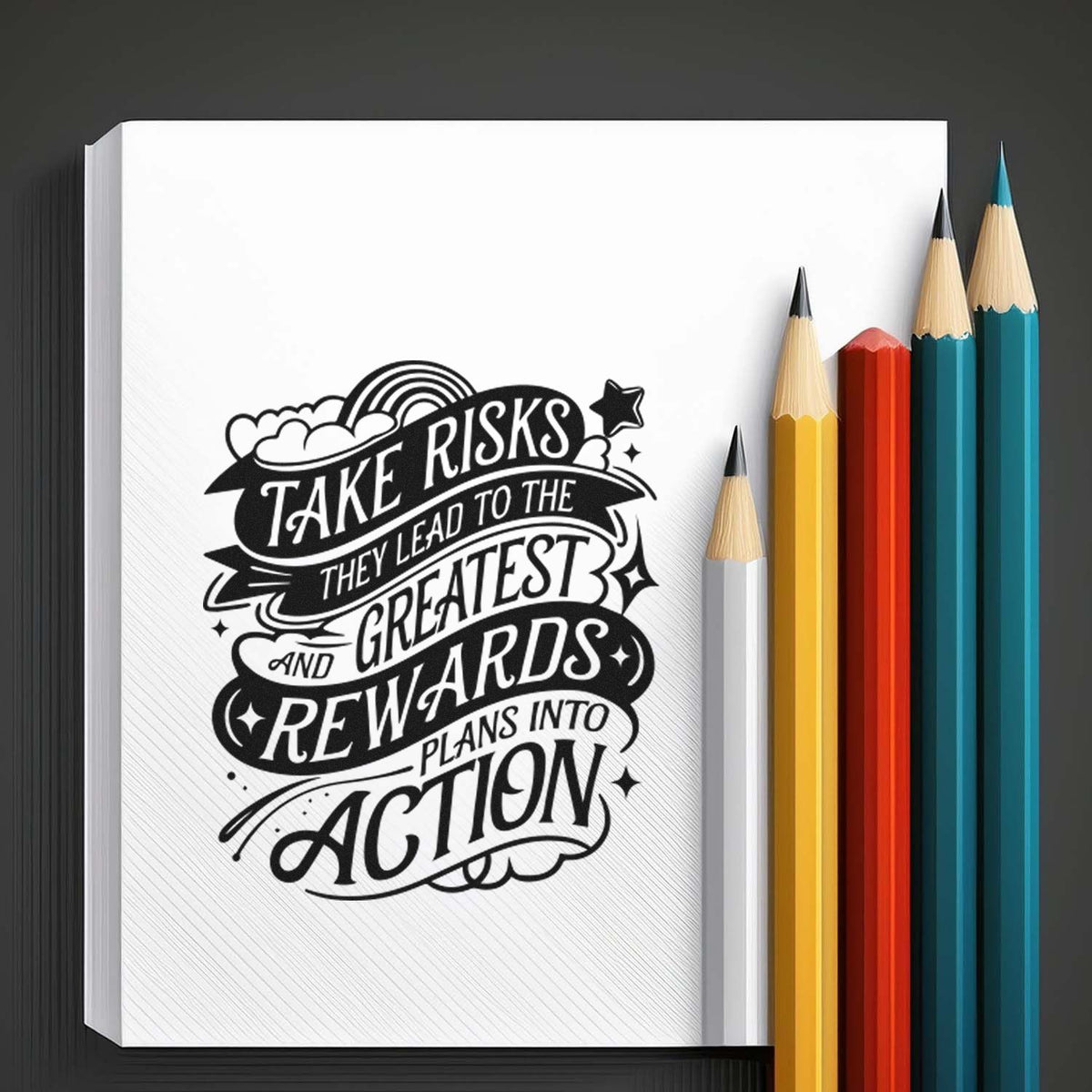 Custom stamp and seal with black motivational quote on white paper, beside yellow, red, teal, and gray pencils.