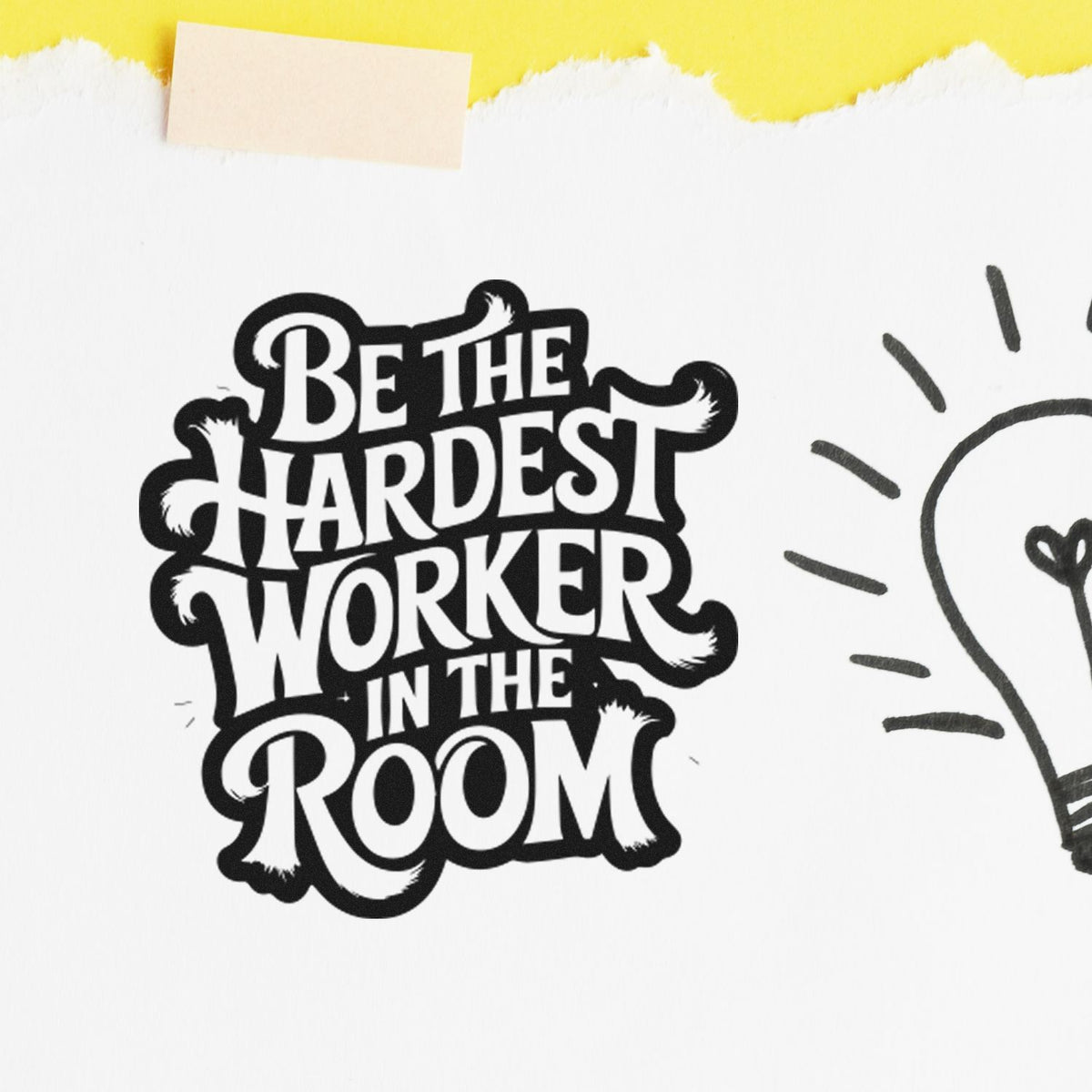Black decorative rubber stamp seal reading Be the Hardest Worker in the Room on white paper with yellow tape and lightbulb doodle