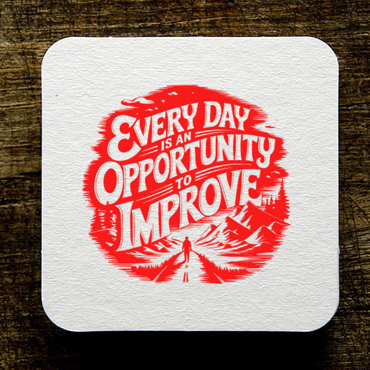 White textured stamp seal with red Every day is an opportunity to improve lettering on a dark wood background.