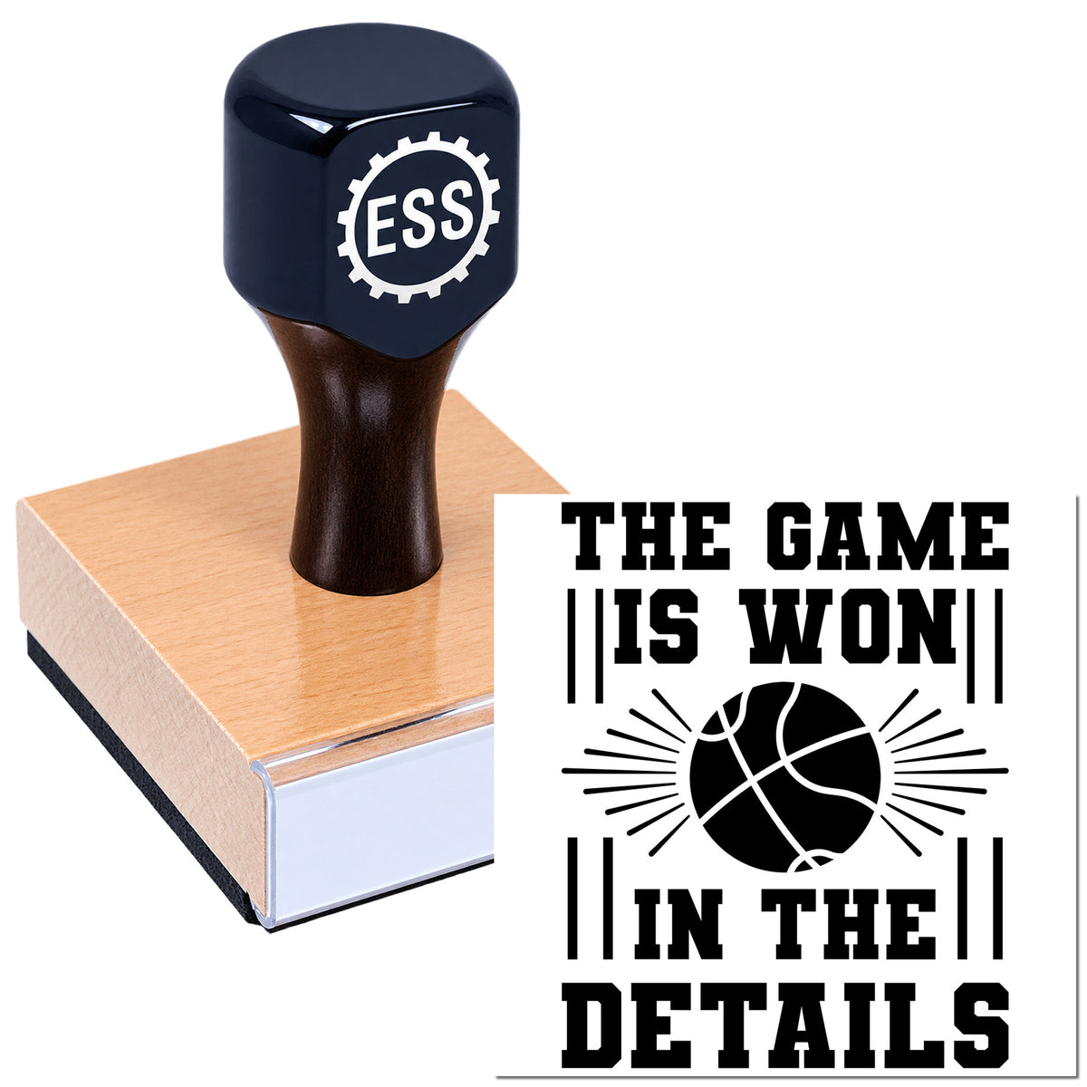 Black ESS stamp and seal on a pink pad with basketball graphic and slogan, "The game is won in the details."