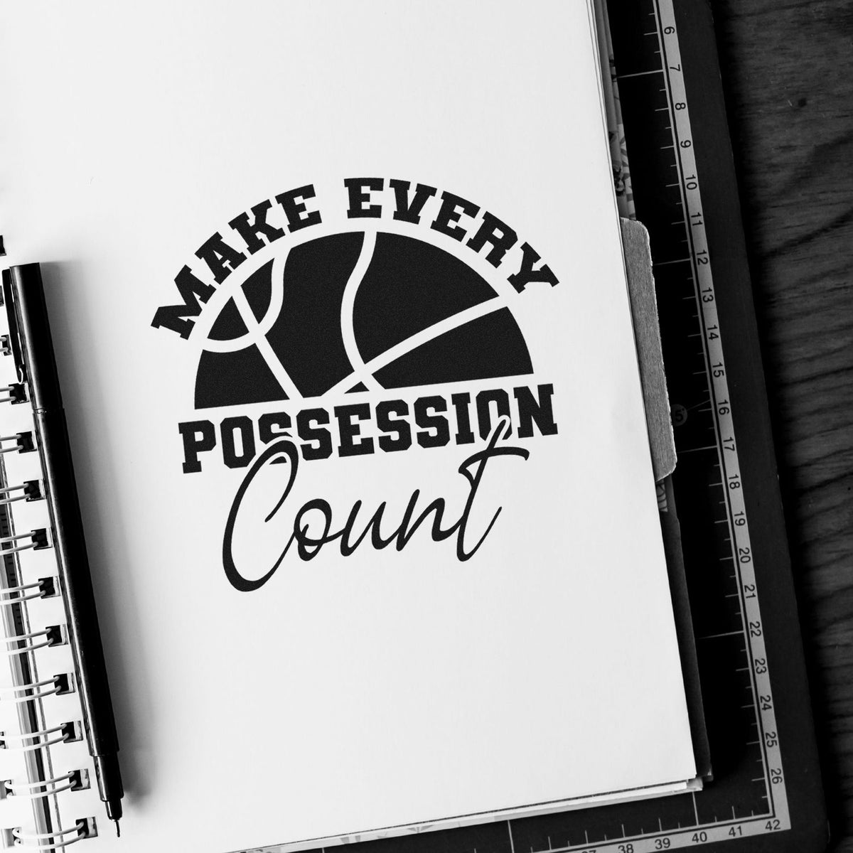 Black basketball stamp and seal design with bold MAKE EVERY POSSESSION and script Count on a white notebook page.