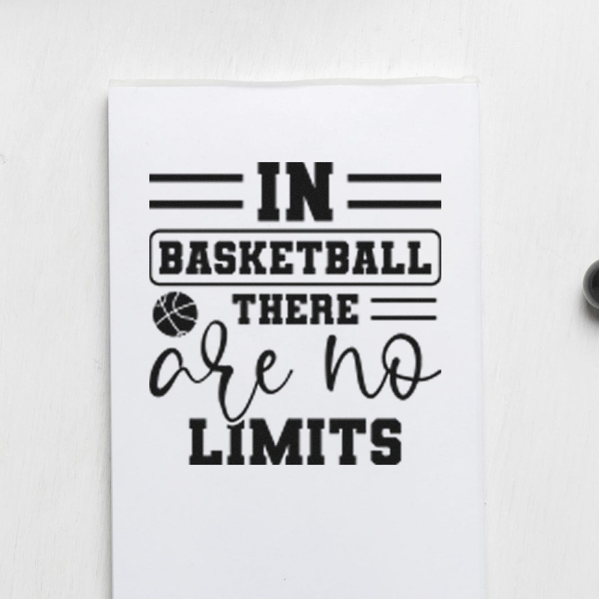 Black basketball stamp seal on white paper reading In basketball there are no limits with a basketball icon.