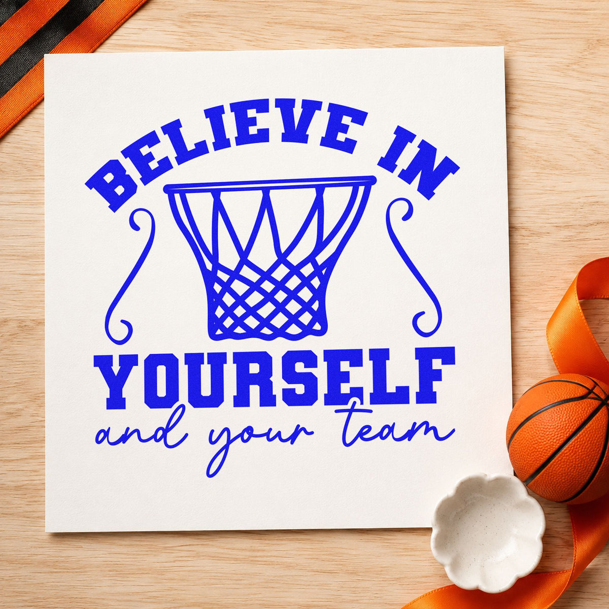 Believe Yourself Your Team craft stamp in blue ink on cardstock, an easy option for concession apron printing.